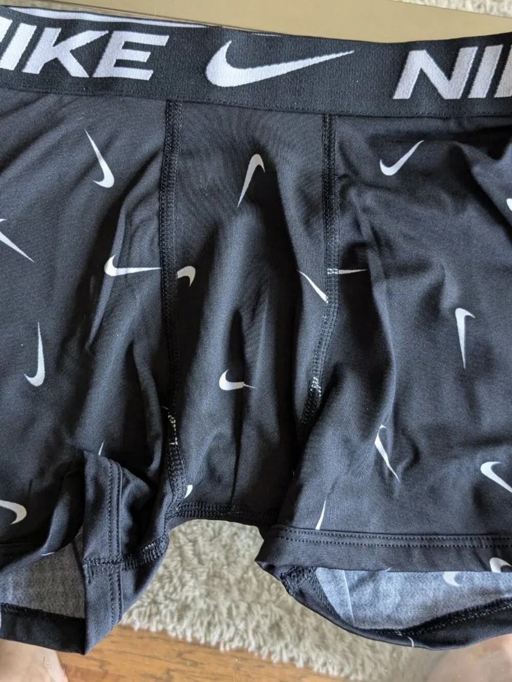 A pair of boy's Nike Dri-Fit Boxer Brief with logos